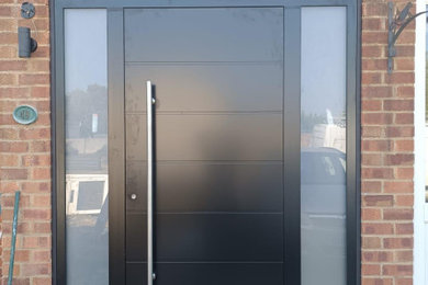 Minimalist entryway photo in London