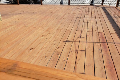 Inspiration for a tropical deck remodel in Milwaukee
