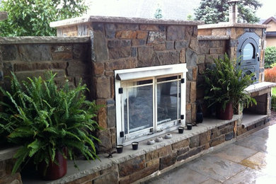 Outdoor fireplace and pizza oven.