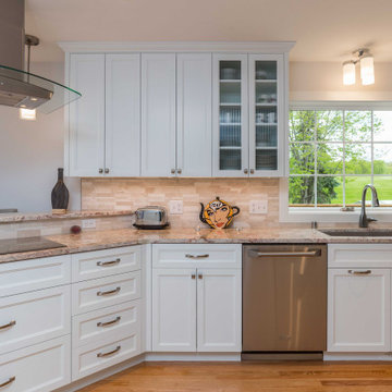 Modern Kitchen with White Flat Panel Shaker Cabinets & Natural Stone Backsplash