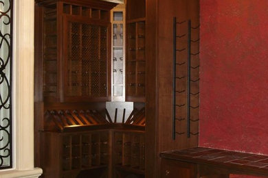 Wine cellar - mediterranean wine cellar idea in Tampa
