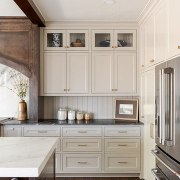 Painted Inset Cabinetry and Leathered Granite in a Transitional Edmond Kitchen