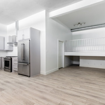 Loft Style Commercial Office Space Kitchen with Custom Renowned Cabinets