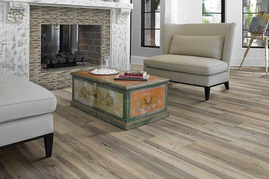 Living room - mid-sized zen formal and open concept light wood floor living room idea in Indianapolis with white walls, no tv, a standard fireplace and a tile fireplace