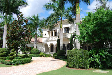 Example of an island style exterior home design in Miami