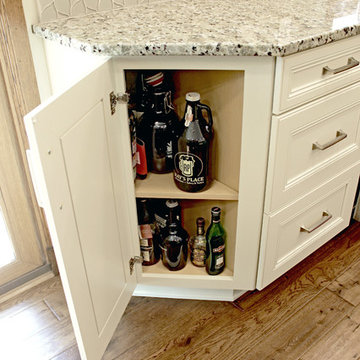 Cream Kitchen with Green Island with Butcher Block Countertop