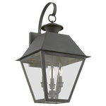Livex Lighting - Wentworth 3 Light Charcoal Outdoor Large Wall Lantern - With its appealing charcoal finish and clear glass, the stunning Mansfield collection will make an elegant addition to any outdoor space. Formed from solid brass & traditionally inspired, this downward hanging three-light outdoor large wall lantern is perfect for a back porch or entry way. Combining superb craftsmanship and affordable price, this fixture is sure to be a timeless addition to your home.