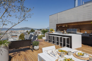 Deck - contemporary deck idea with a bbq area and no cover