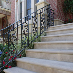 Solid stone stairs with ornamental iron railing - Products