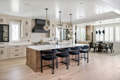 Inspiration for a cottage kitchen remodel in Charlotte with an island