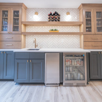 Warm & Inviting Basement Retreat with Custom Bar + Entertainment Center