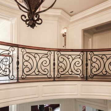 Project #74 | Circular Staircase with Hand-Forged Metal Panels