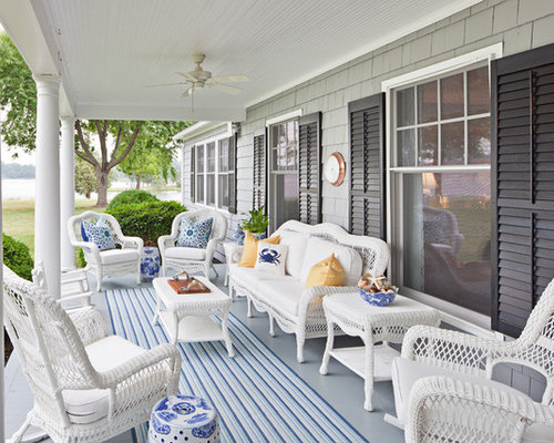 Classic Nautical Porch Classic porch idea in Baltimore with a roof extension