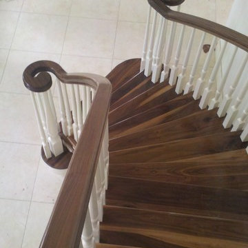 Curved Wallnut and painted continuous handrail