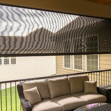 Screen Room Addition with Retractable Screens, Outdoor Kitchen, and Patio