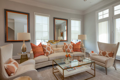 Example of a mid-sized classic formal and open concept medium tone wood floor living room design in Houston with gray walls, no fireplace and no tv