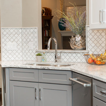 Kitchen | Two-Tone Cabinets | Cambria Quartz | Arabesque Marble Backsplash