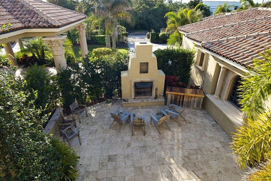 Patio - large mediterranean patio idea in Orlando