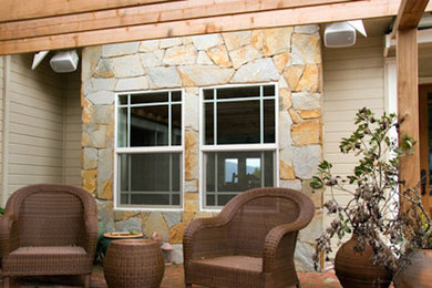 Inspiration for a timeless patio remodel in Dallas with a pergola