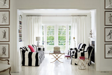 Family room library - mid-sized traditional white floor family room library idea in San Francisco with white walls, a standard fireplace and no tv