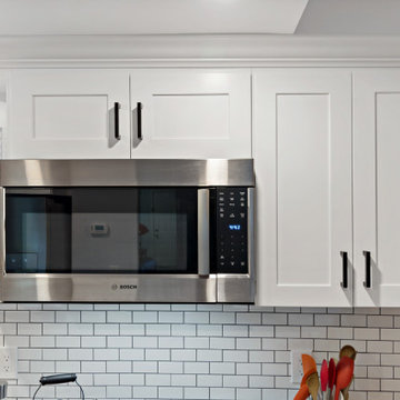 Streamlined Transitional Kitchen in Laguna Niguel with White Shaker Cabinets