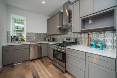 Kitchen - industrial kitchen idea in Other