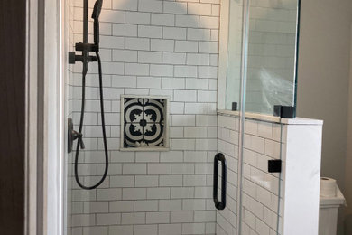 Small elegant 3/4 white tile and cement tile single-sink bathroom photo in Los Angeles with glass-front cabinets, gray cabinets and a freestanding vanity