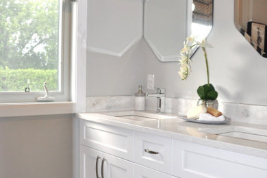 Bathroom - small contemporary master gray tile and porcelain tile porcelain tile and gray floor bathroom idea in Ottawa with shaker cabinets, white cabinets, an undermount sink, granite countertops and white countertops