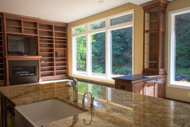 Inspiration for a living room remodel in Portland with a media wall
