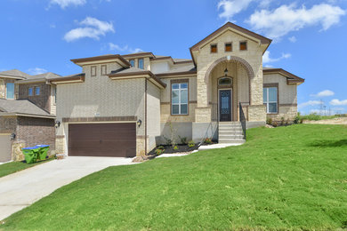 Example of a tuscan exterior home design in Austin