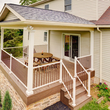 Deck with roof over and stone veneer