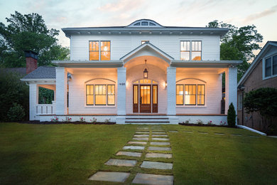 Large transitional exterior home idea in Atlanta