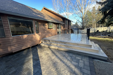 Custom back deck with hardscape patio's
