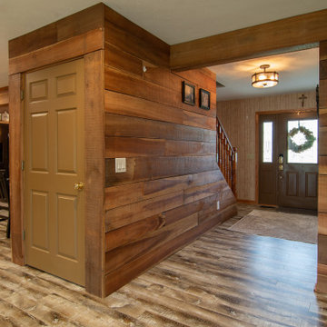 Rustic Kitchen showcasing fireclay farm house sink & eye-catching wood beam