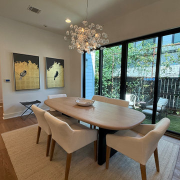 Light + Airy Dining Room with Wall-to-Wall Windows + Modern Seating