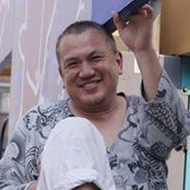 田中栄一s billede