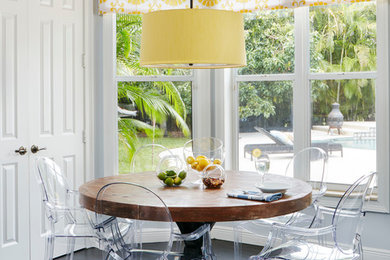 Transitional porcelain tile kitchen/dining room combo photo in Miami