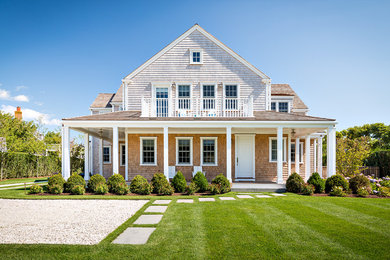Inspiration for a coastal two-story wood gable roof remodel in Boston