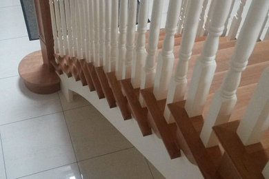 Cherry and paint cut-string stairs