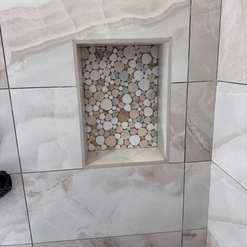 Curd-less walk-in shower; heated floors in bathroom + shower+bench LED