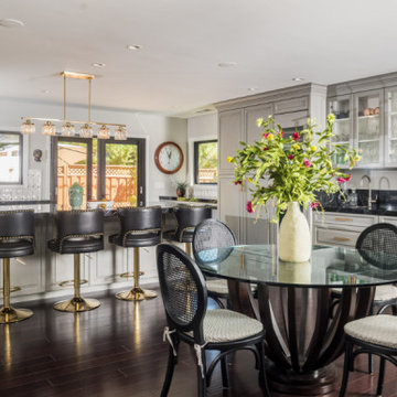 Elegant Open-Concept Gray Kitchen with Luxe Gold Accents