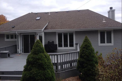 Inspiration for a gray one-story exterior home remodel in Milwaukee