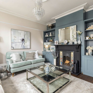 Calm & serene living room with a mix of chrome & brass metal accents