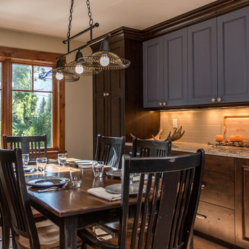 Contemporary farmhouse style dining room with granite buffet