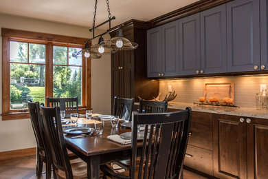 Inspiration for a contemporary ceramic tile kitchen/dining room combo remodel in Denver