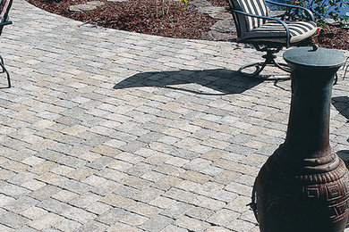 Patio fountain - large transitional backyard concrete patio fountain idea in Boston with no cover