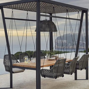 Skyline Design Horizon Pergola with Lamp Hanging Chairs & Teak Table