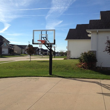 Tim B's Pro Dunk Gold Basketball System on a 30x30 in Marion, IA