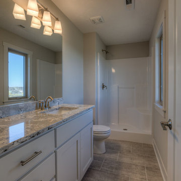 Custom Newport w/ side-load garage and master w/ sitting room
