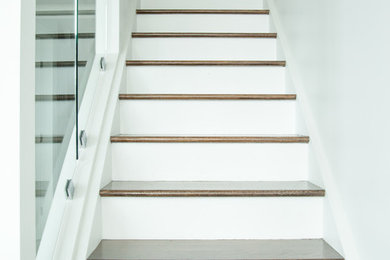 Minimalist staircase photo in Vancouver